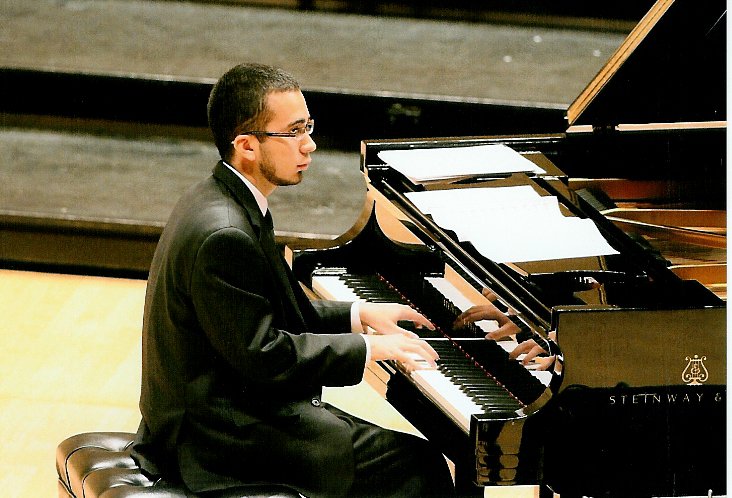 Steven Solomon performing on a Steinway at his Carnegie Hall debut