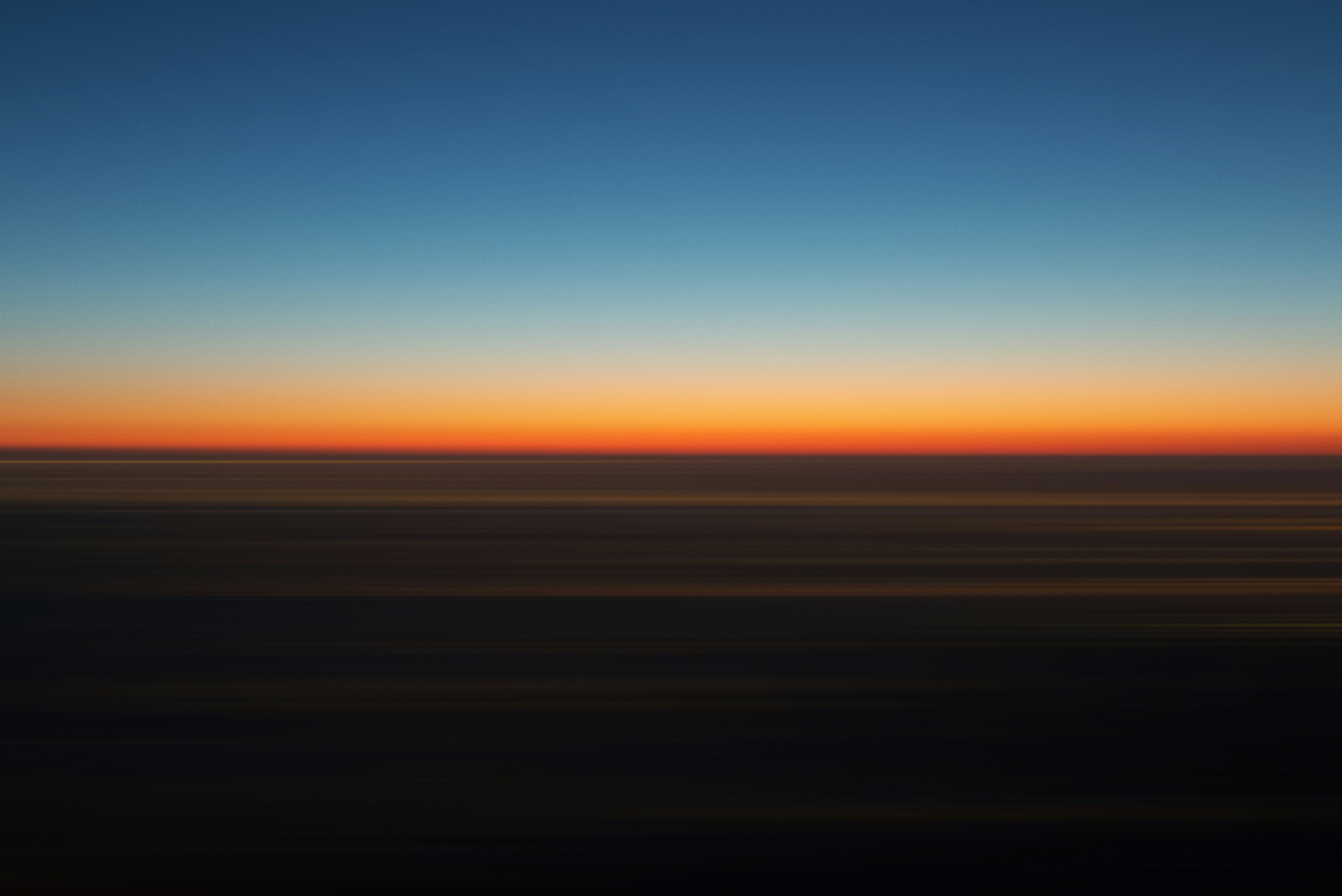 A still horizon at dusk